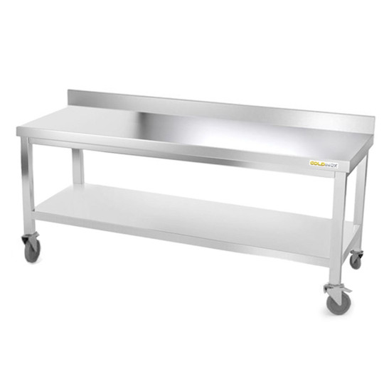 Table inox soubassement 2000 x 700 mm adossée sur roulettes / GOLDINOX